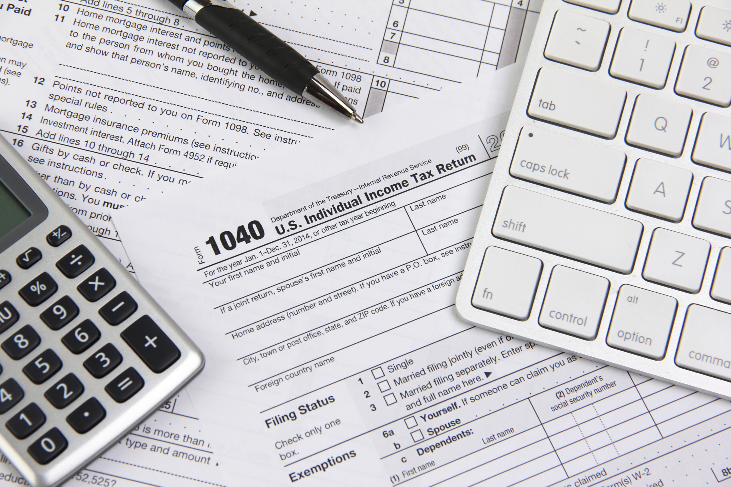 How do taxes work as an income partner at a big law firm?